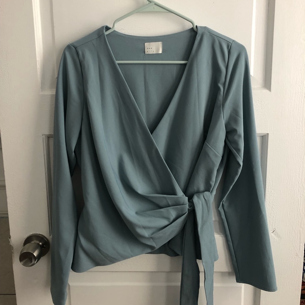 V-neck light blue/teal wrap top